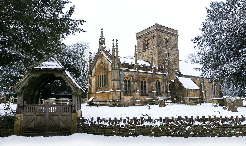 Photograph of the Church with snow cover and loch gate in the foreground. Copyright Martin Horton